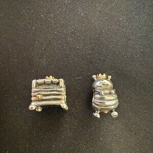 Two Pandora Charms with Gold